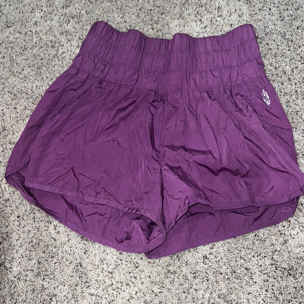 Free people athletic shorts size medium, color purple.